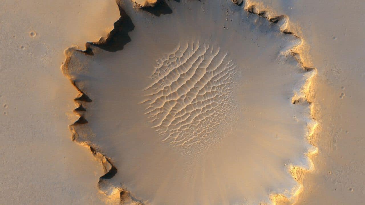 Crater. Featured image for podcast episode "How do you measure a Mars quake?"