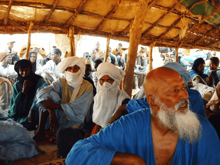 A gathering of people - Community meeting to discuss the problem of environmental degradation