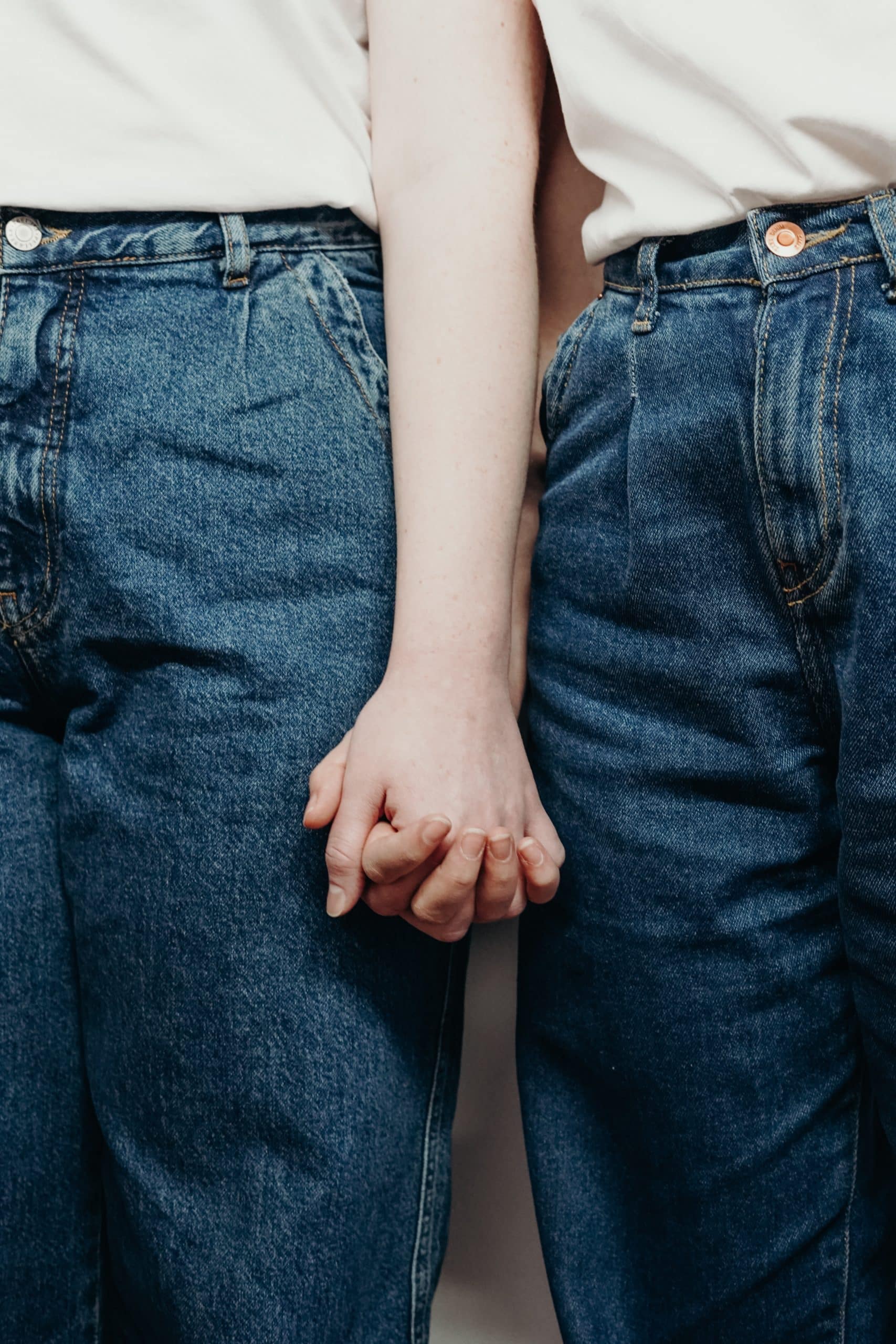 Couple holding hands. Image for the podcast episode "Can data find me a date?"