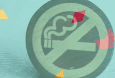 Can e-cigarettes help you stop smoking? Image of a 'no-smoking' sign on a teal background.