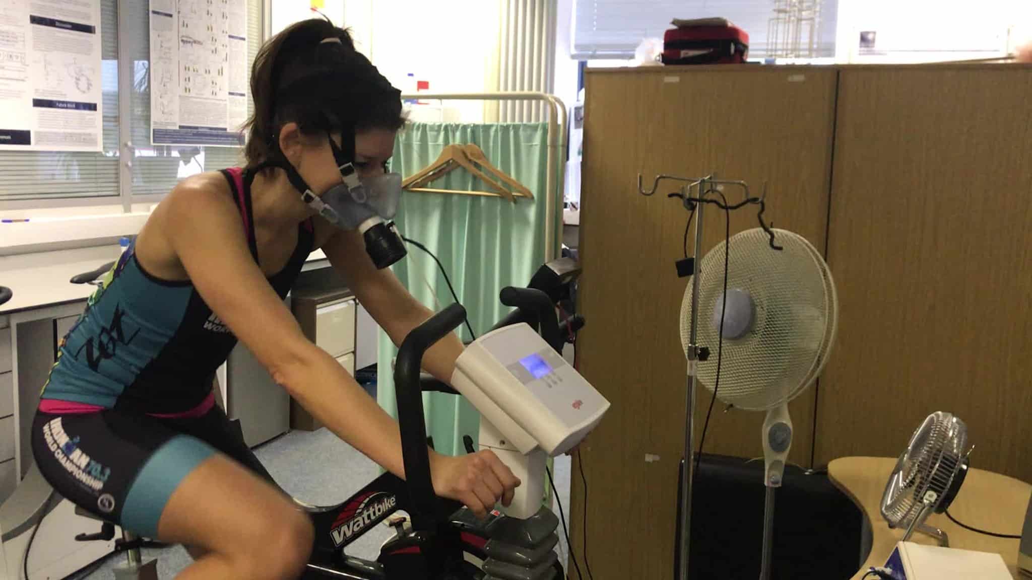 Kirsty on an exercise bike, being monitored.