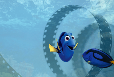 'Dory' from Disney Pixar's 'Finding Dory' and a real-life blue tang fish. Featured image for video 'Movies and the Wildlife Trade'.