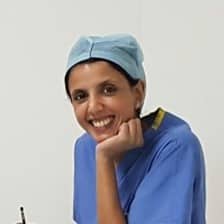 Photo of Sushma Shankar in surgeon gear