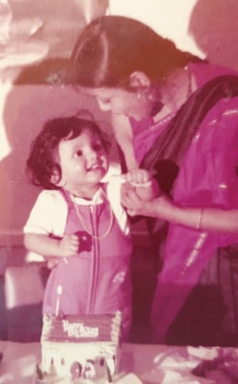 Sushma and her mum on Sushma's first birthday