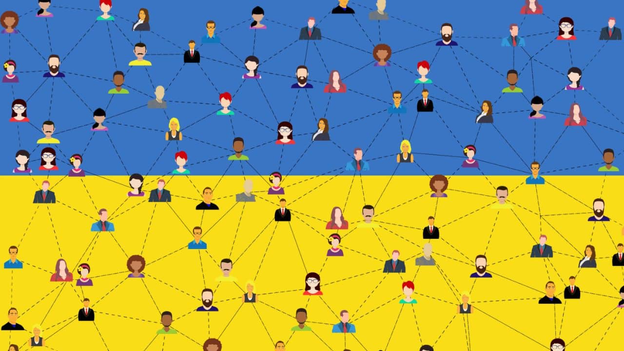 A network of cartoon people against a backdrop of the Ukrainian flag. Website image for the podcast episode 'How do you use social media to deliver humanitarian aid?'