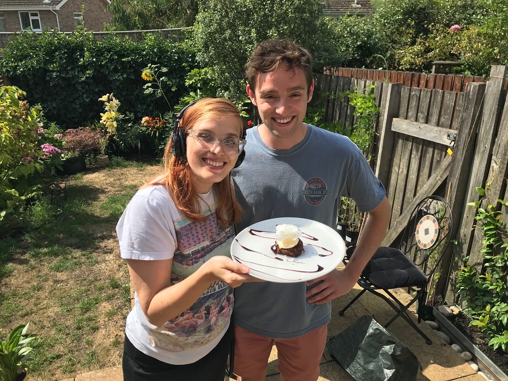Emily and Luke with their microwaved cooked cake
