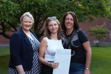 Eve on results day with her Mum and the Head Mistress of Manchester High School