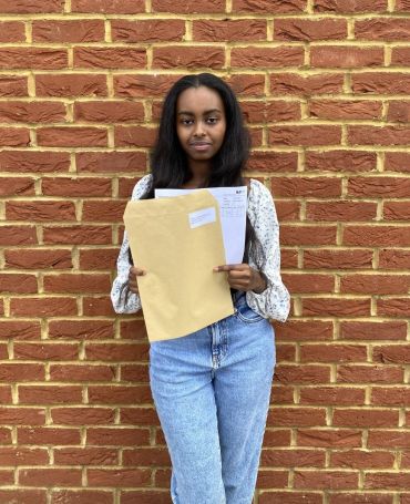 Samrawit receiving her results at the Harris Academy, Merton