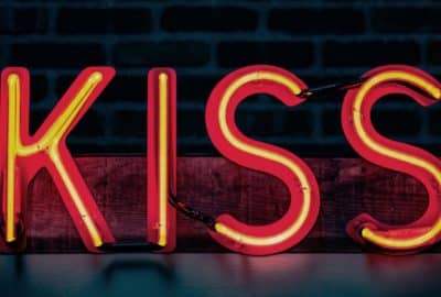 Neon letters spelling kiss