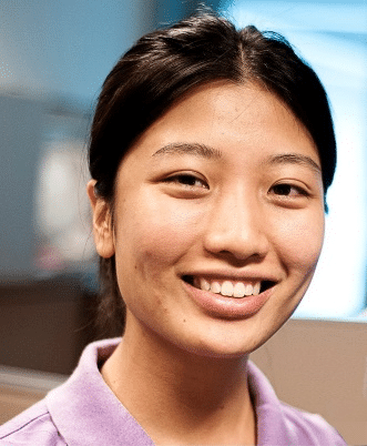 East Asian woman smiling